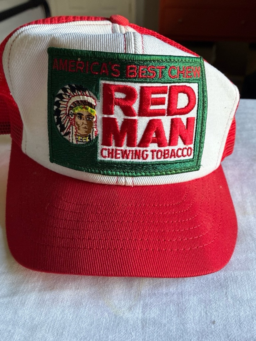 Logo Red & White Trucker Hat Red Man